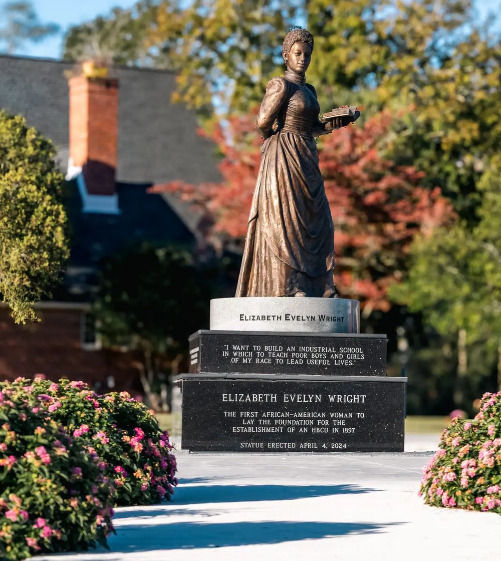 Bronze statue of Voorhees founder Elizabeth Evelyn Wright on the University campus