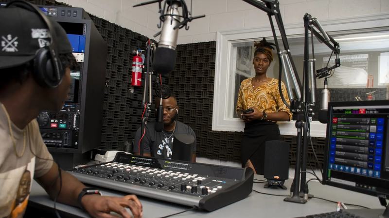Students working in the Voorhees University radio studio